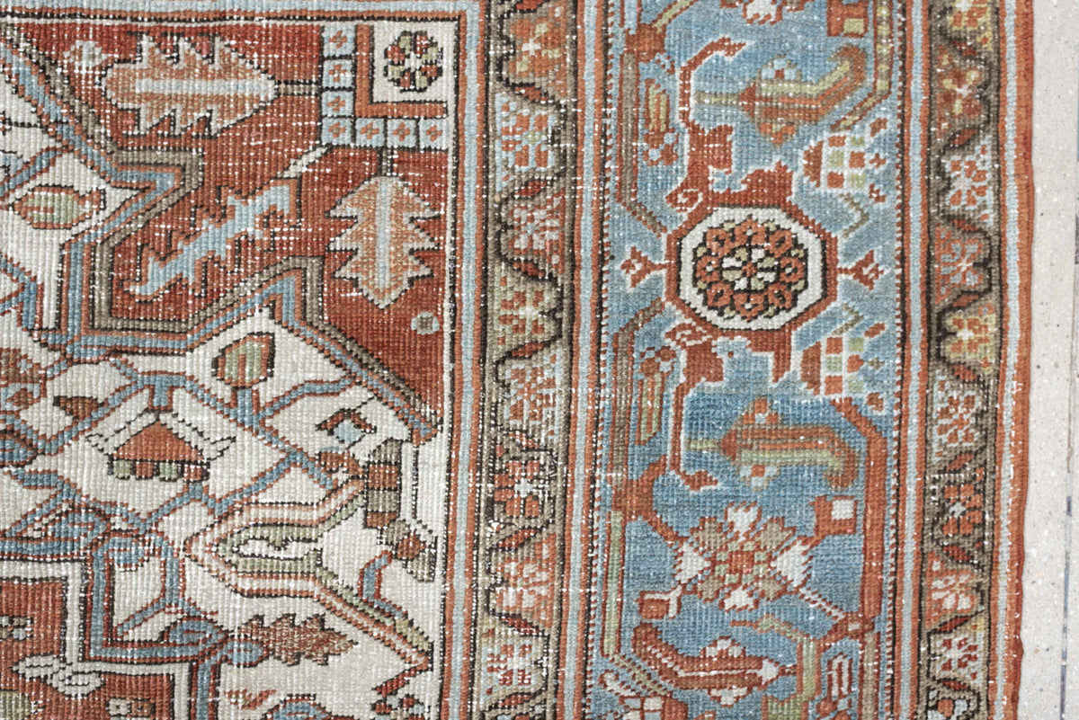 7' x 10' one-of-a-kind handmade antique Heriz large size rug. Color palette: rust, powder blue, ivory, sage, terracotta