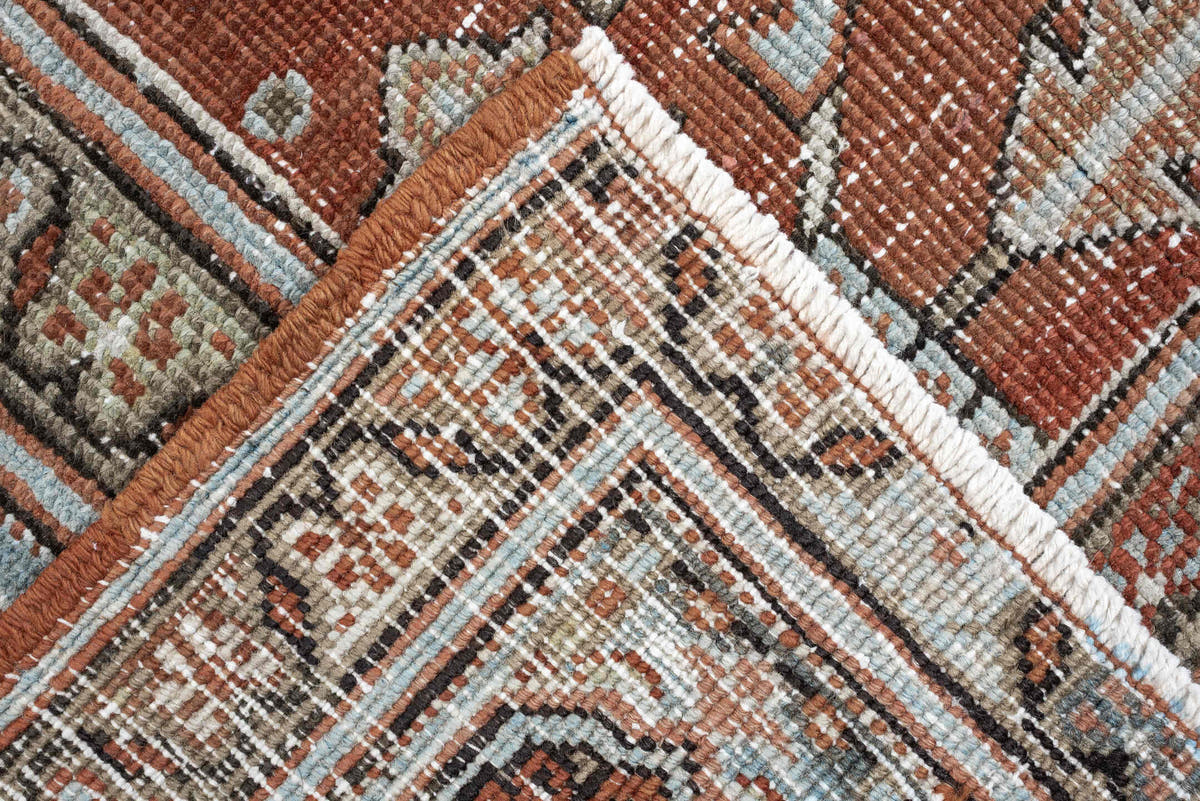 7' x 10' one-of-a-kind handmade antique Heriz large size rug. Color palette: rust, powder blue, ivory, sage, terracotta