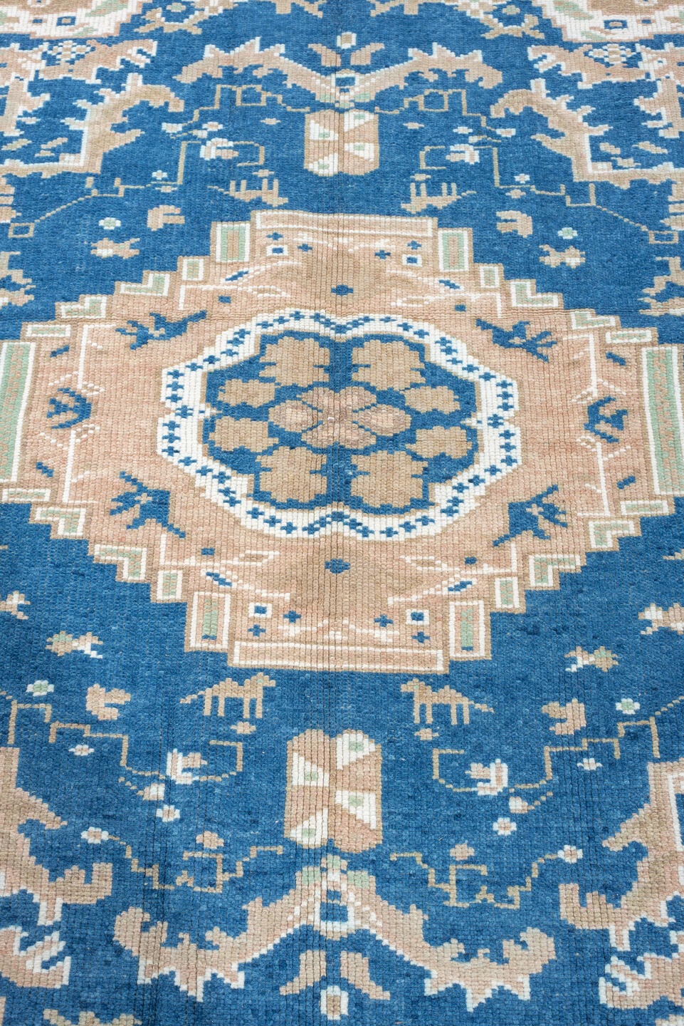 5' x 8' one-of-a-kind handmade antique Moroccan medium size rug. Color palette: blush, indigo, ivory, taupe, sage, camel