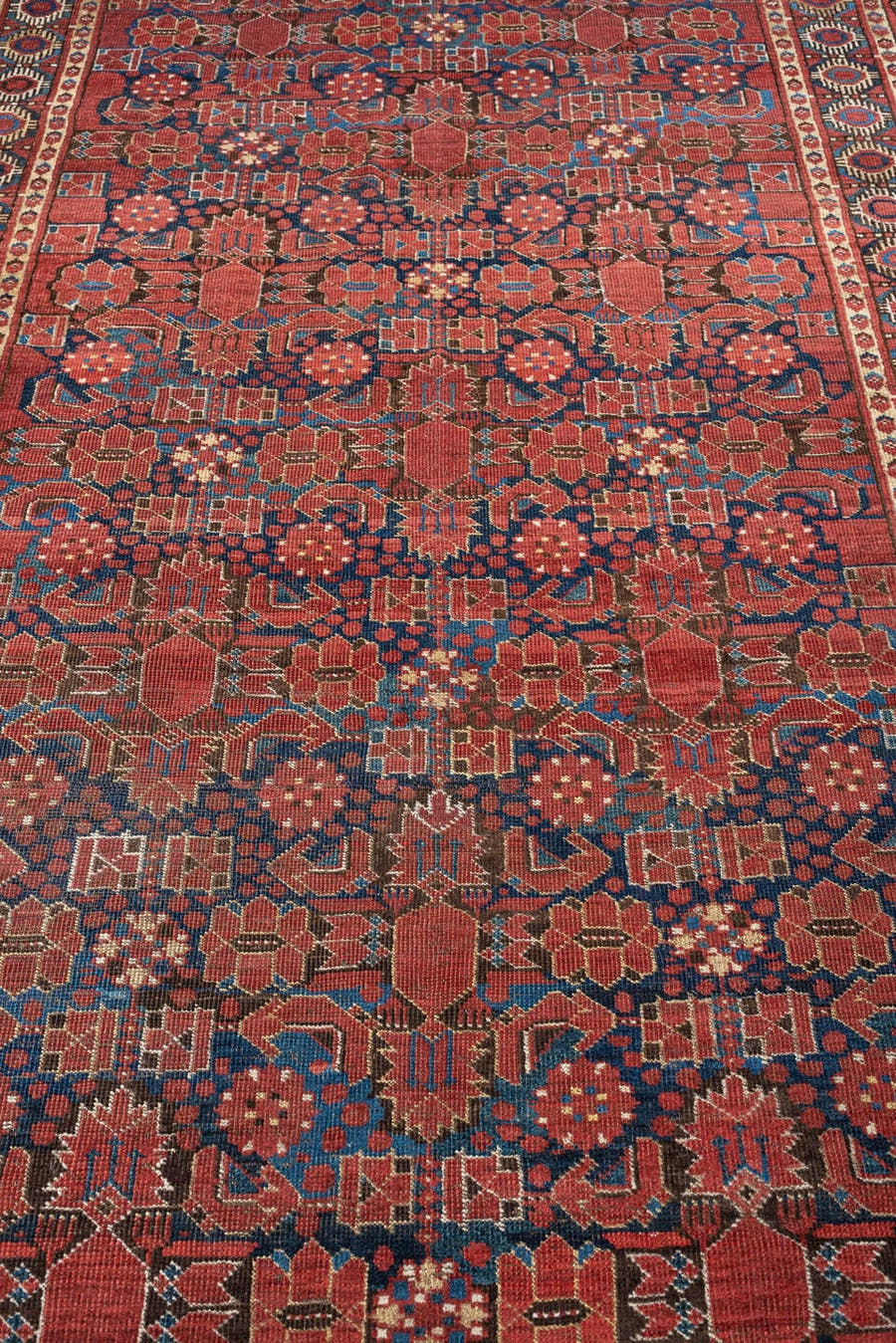 5' x 9' one-of-a-kind handmade antique Beshir medium size rug. Color palette: madder red, indigo, ivory, coral, teal, rust