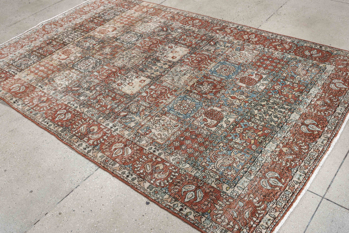 5' x 8' one-of-a-kind handmade antique Baktiary medium size rug. Color palette: terracotta, ivory, charcoal, slate blue