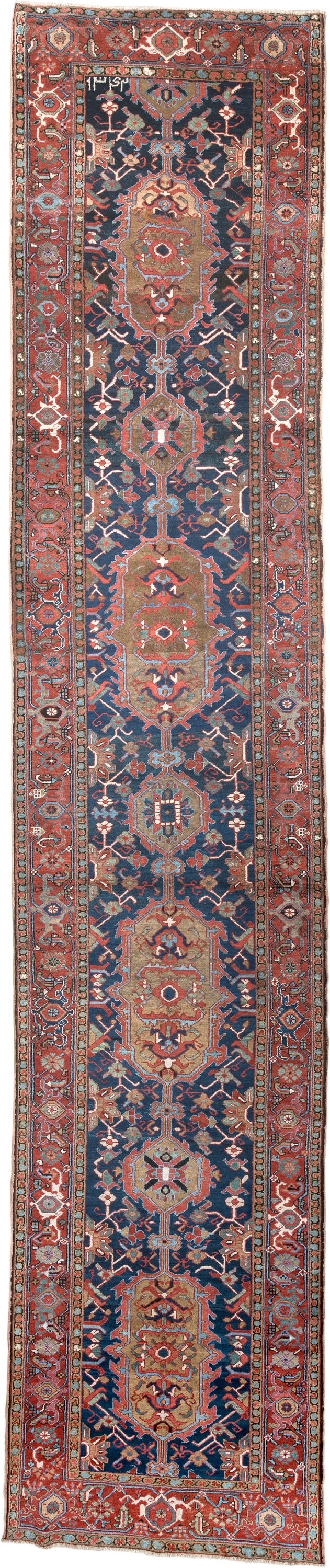 3' x 18' one-of-a-kind handmade antique Serapi runner rug. Color palette: navy, brick red, rust, camel, ivory, muted teal