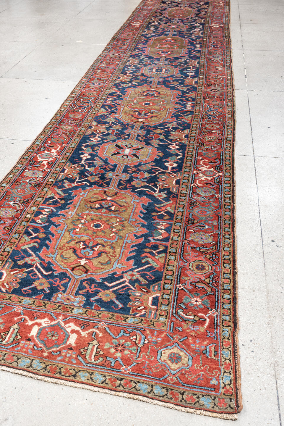 3' x 18' one-of-a-kind handmade antique Serapi runner rug. Color palette: navy, brick red, rust, camel, ivory, muted teal