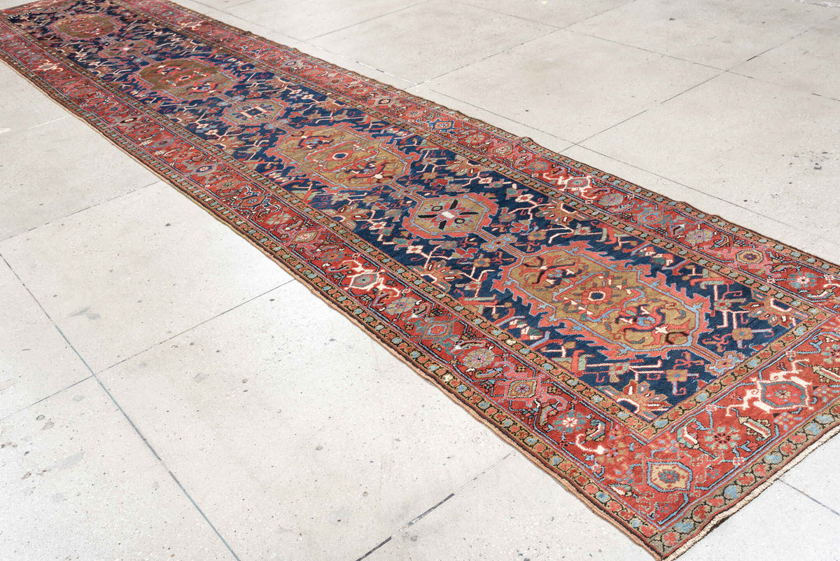 3' x 18' one-of-a-kind handmade antique Serapi runner rug. Color palette: navy, brick red, rust, camel, ivory, muted teal