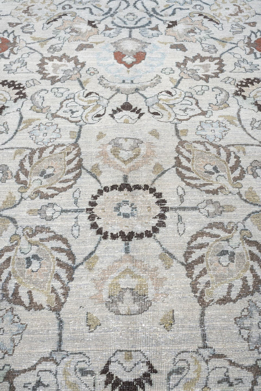10' x 16' one-of-a-kind handmade antique Meshed rug. Color palette: ivory, slate blue, terracotta, taupe, charcoal, cream