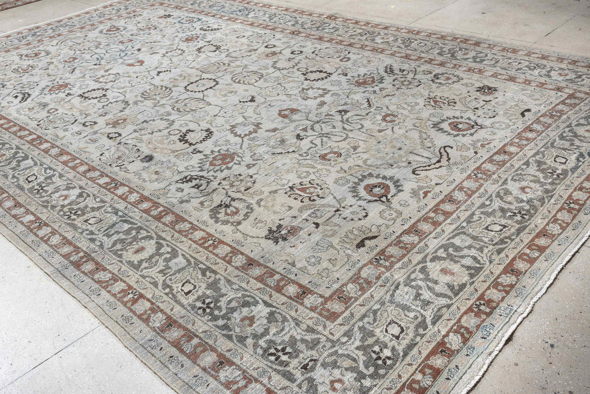 10' x 16' one-of-a-kind handmade antique Meshed rug. Color palette: ivory, slate blue, terracotta, taupe, charcoal, cream