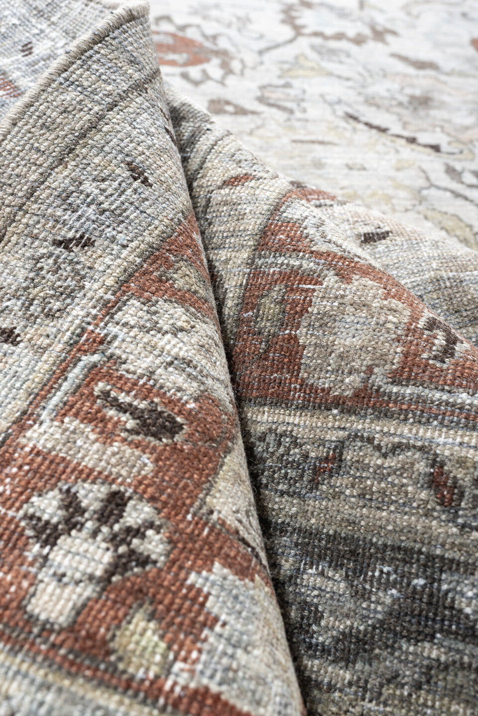 10' x 16' one-of-a-kind handmade antique Meshed rug. Color palette: ivory, slate blue, terracotta, taupe, charcoal, cream