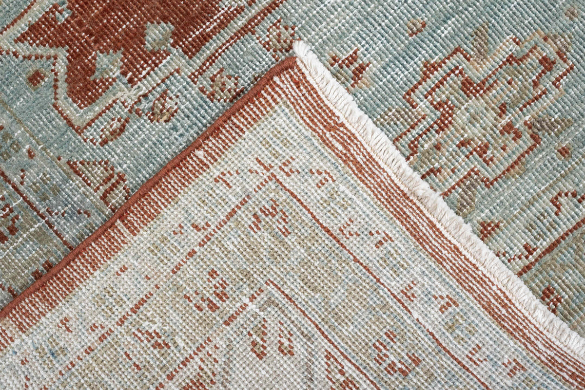 8' x 7' one-of-a-kind handmade antique Veece rug. Color palette: terracotta, ivory, pale blue gray, rust, taupe, sage, coral