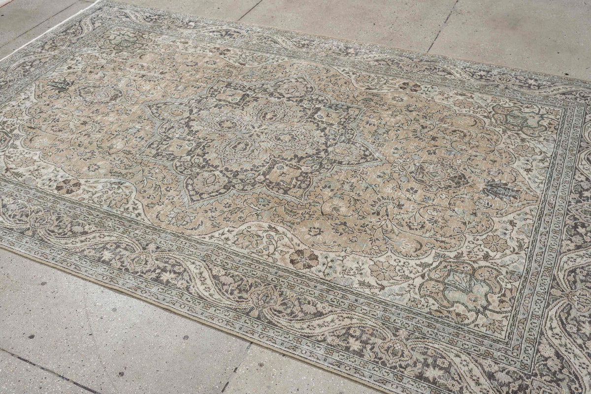 5' x 8' one-of-a-kind handmade antique Tabriz medium size rug. Color palette: ivory, taupe, charcoal, stone, sage, camel