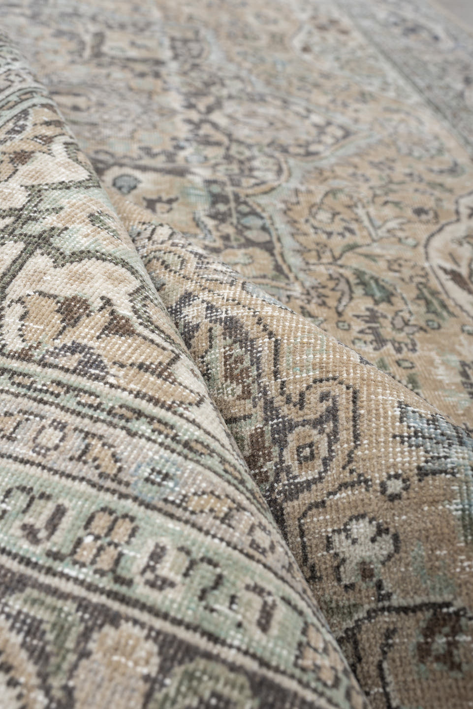 5' x 8' one-of-a-kind handmade antique Tabriz medium size rug. Color palette: ivory, taupe, charcoal, stone, sage, camel