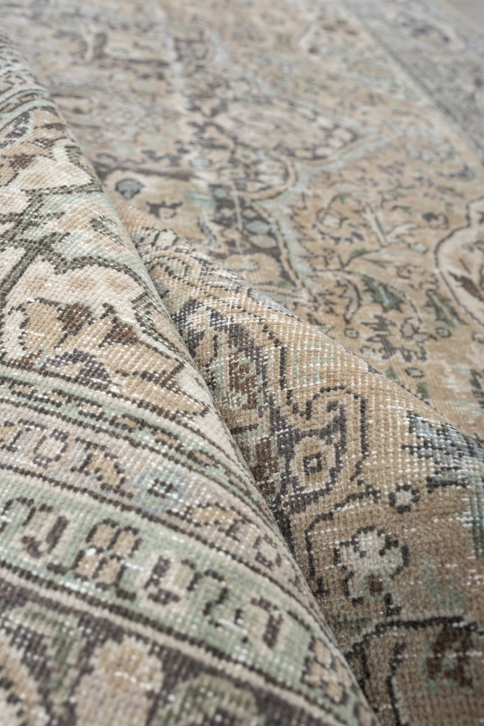 5' x 8' one-of-a-kind handmade antique Tabriz medium size rug. Color palette: ivory, taupe, charcoal, stone, sage, camel