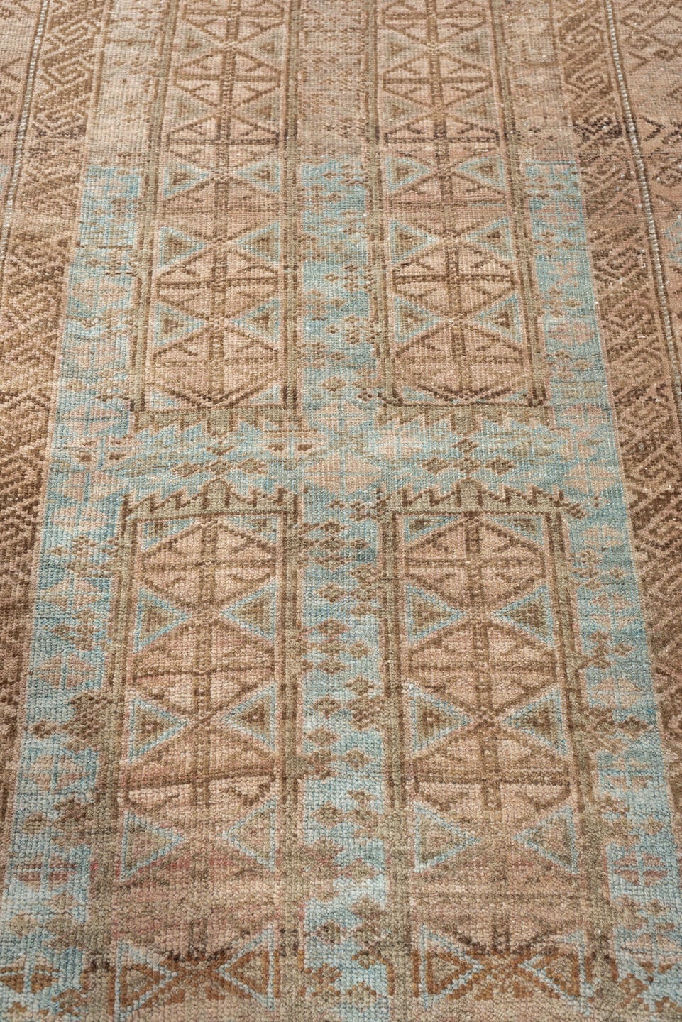 3' x 5' one-of-a-kind handmade antique Belouch small size rug. Color palette: camel, taupe, pale blue, ivory, brown, slate