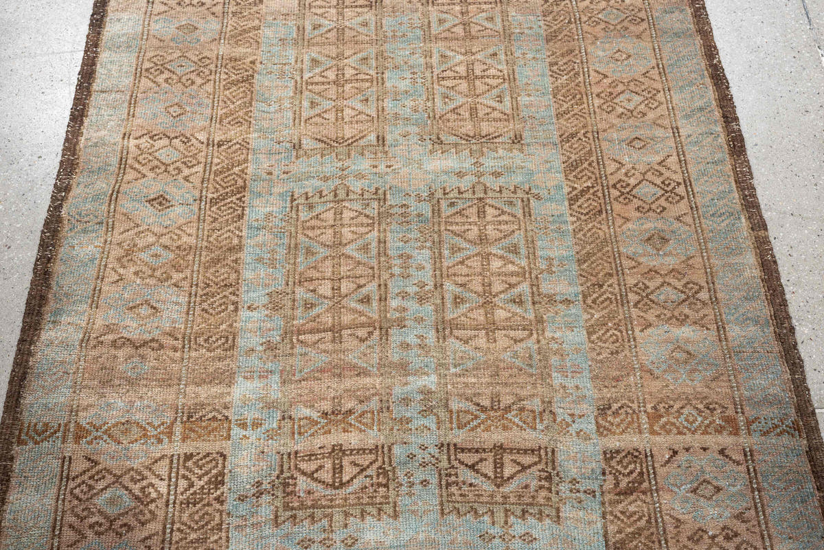 3' x 5' one-of-a-kind handmade antique Belouch small size rug. Color palette: camel, taupe, pale blue, ivory, brown, slate