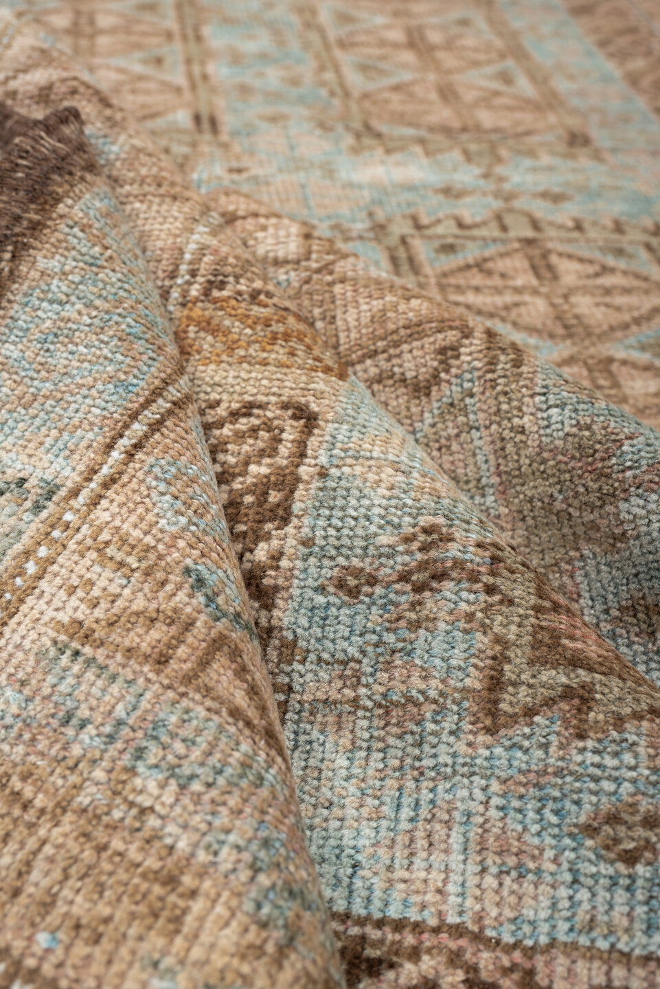 3' x 5' one-of-a-kind handmade antique Belouch small size rug. Color palette: camel, taupe, pale blue, ivory, brown, slate