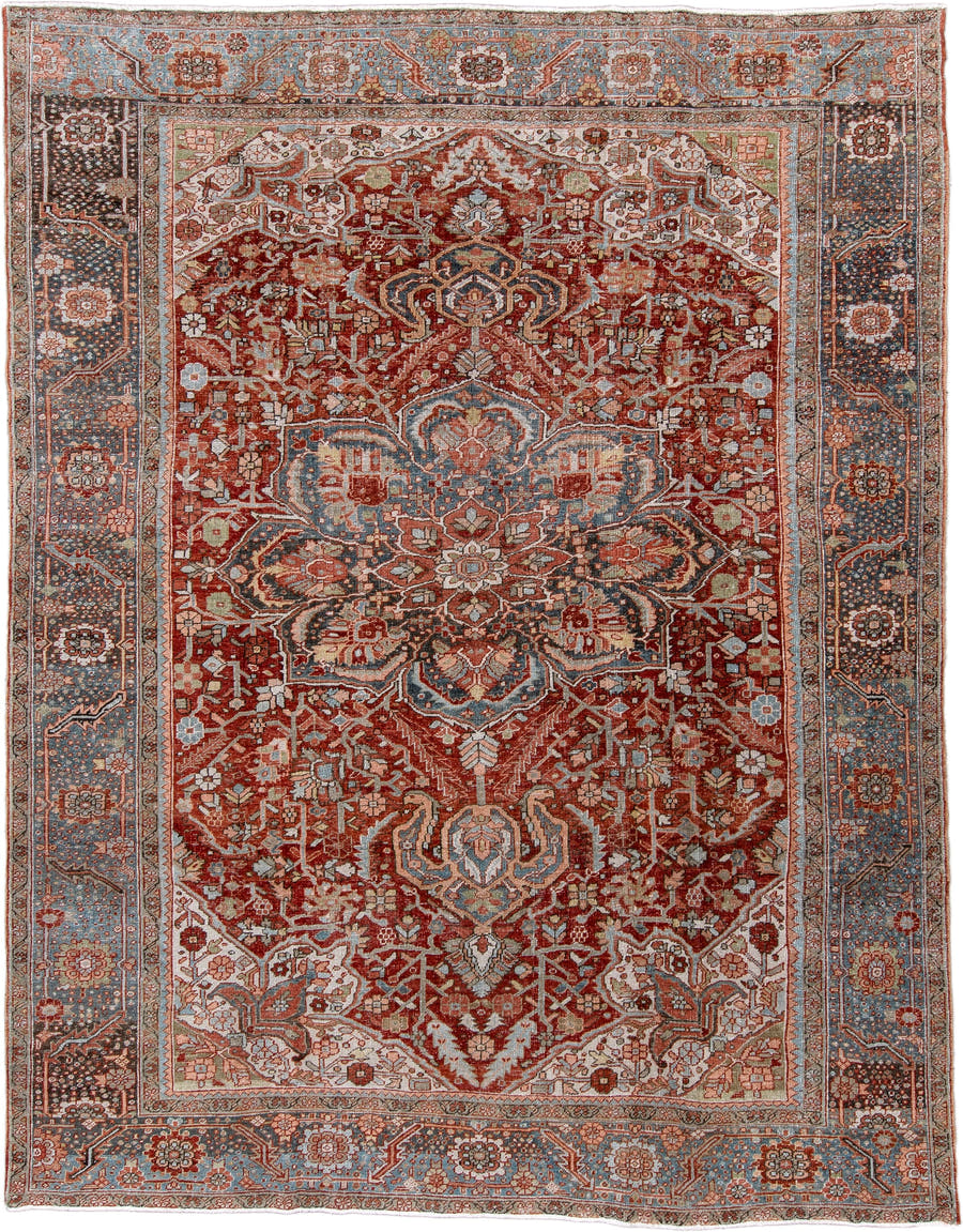 8' x 11' one-of-a-kind handmade antique Heriz large size rug. Color palette: rust, powder blue, ivory, navy, terracotta