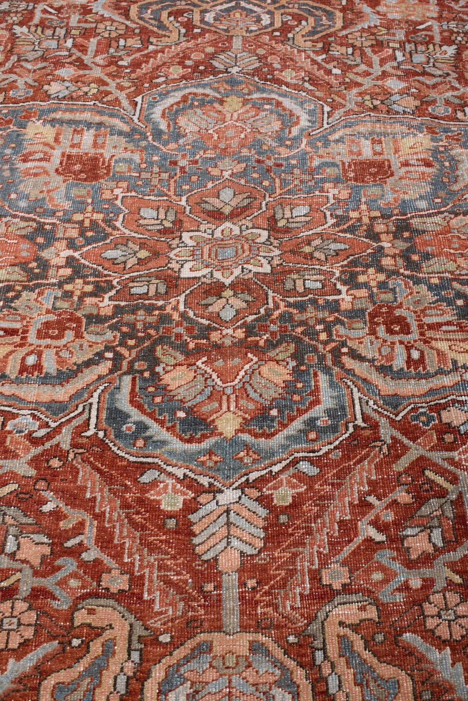 8' x 11' one-of-a-kind handmade antique Heriz large size rug. Color palette: rust, powder blue, ivory, navy, terracotta