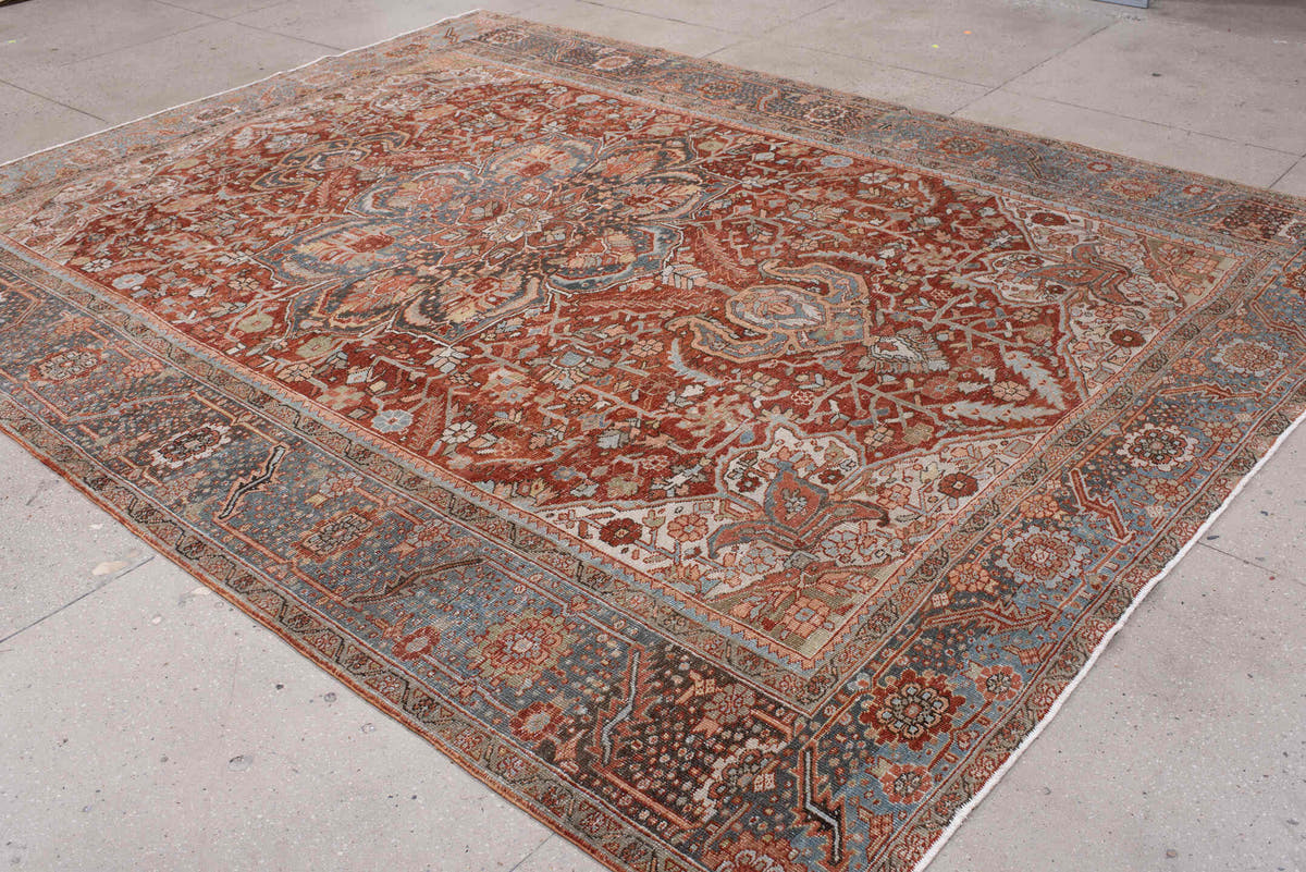 8' x 11' one-of-a-kind handmade antique Heriz large size rug. Color palette: rust, powder blue, ivory, navy, terracotta