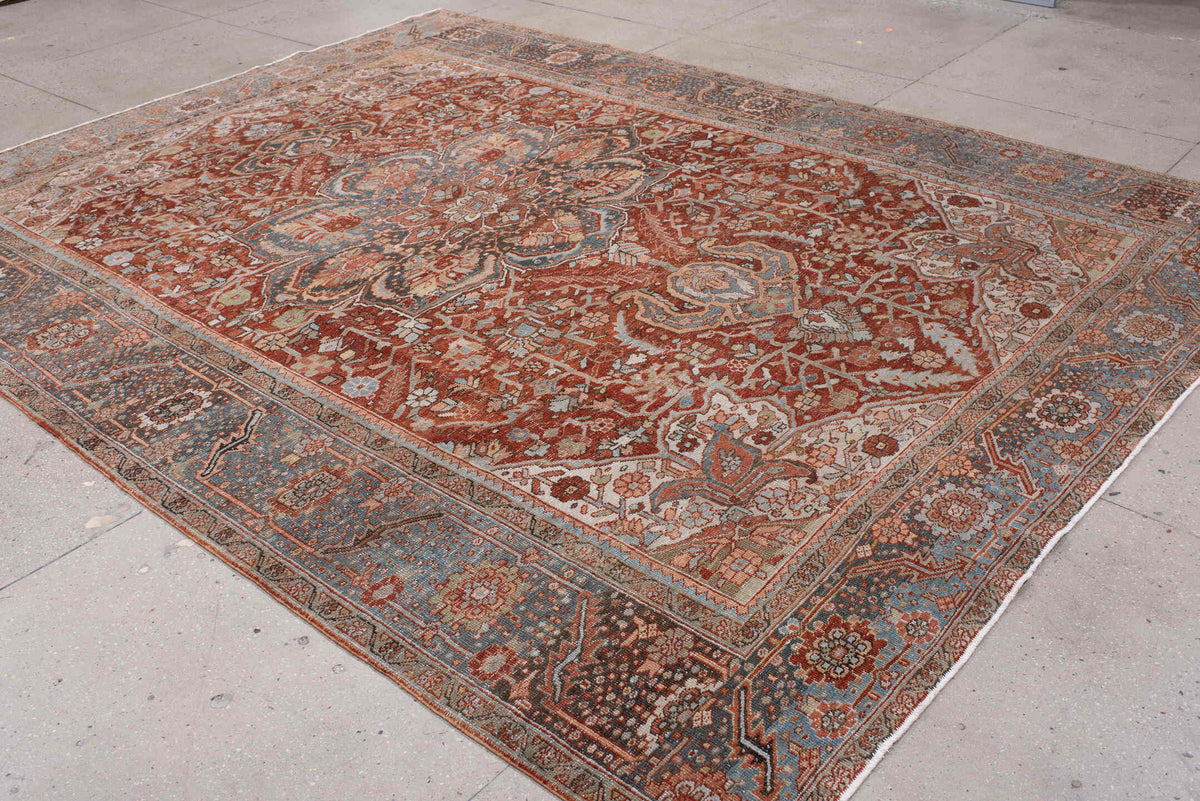8' x 11' one-of-a-kind handmade antique Heriz large size rug. Color palette: rust, powder blue, ivory, navy, terracotta