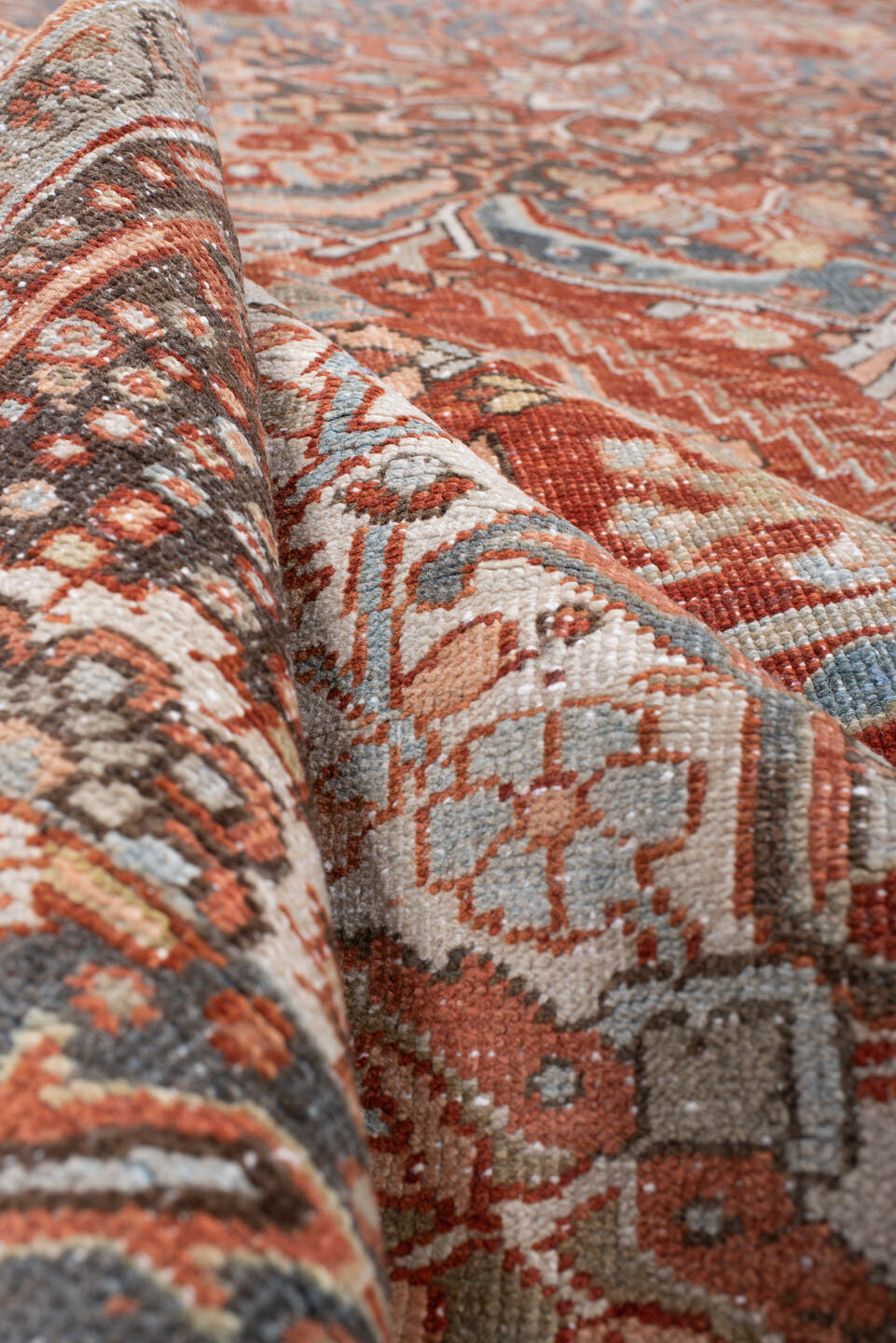 8' x 11' one-of-a-kind handmade antique Heriz large size rug. Color palette: rust, powder blue, ivory, navy, terracotta