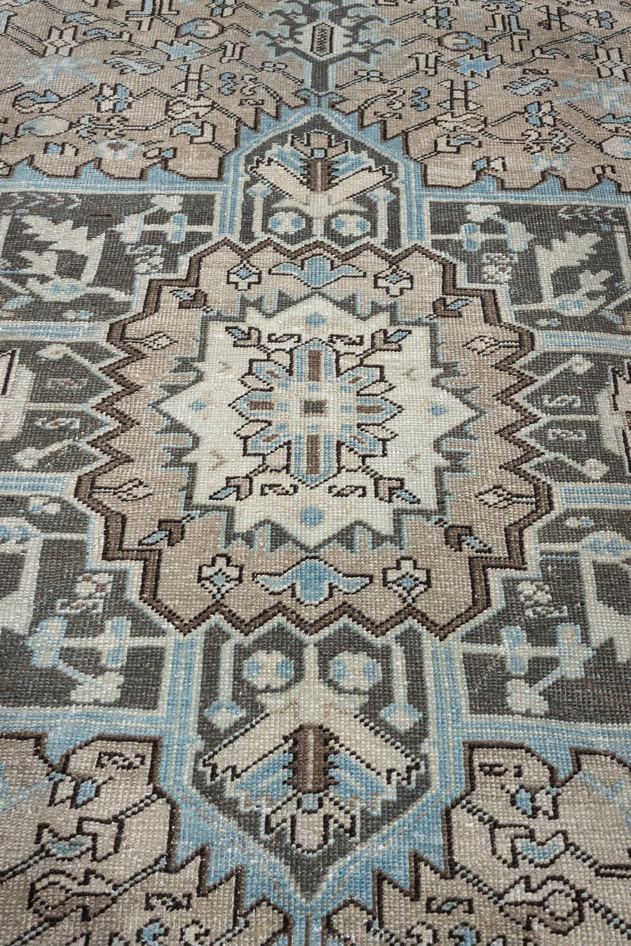 7' x 11' one-of-a-kind handmade antique Heriz large size rug. Color palette: ivory, taupe, charcoal, slate blue, dark brown