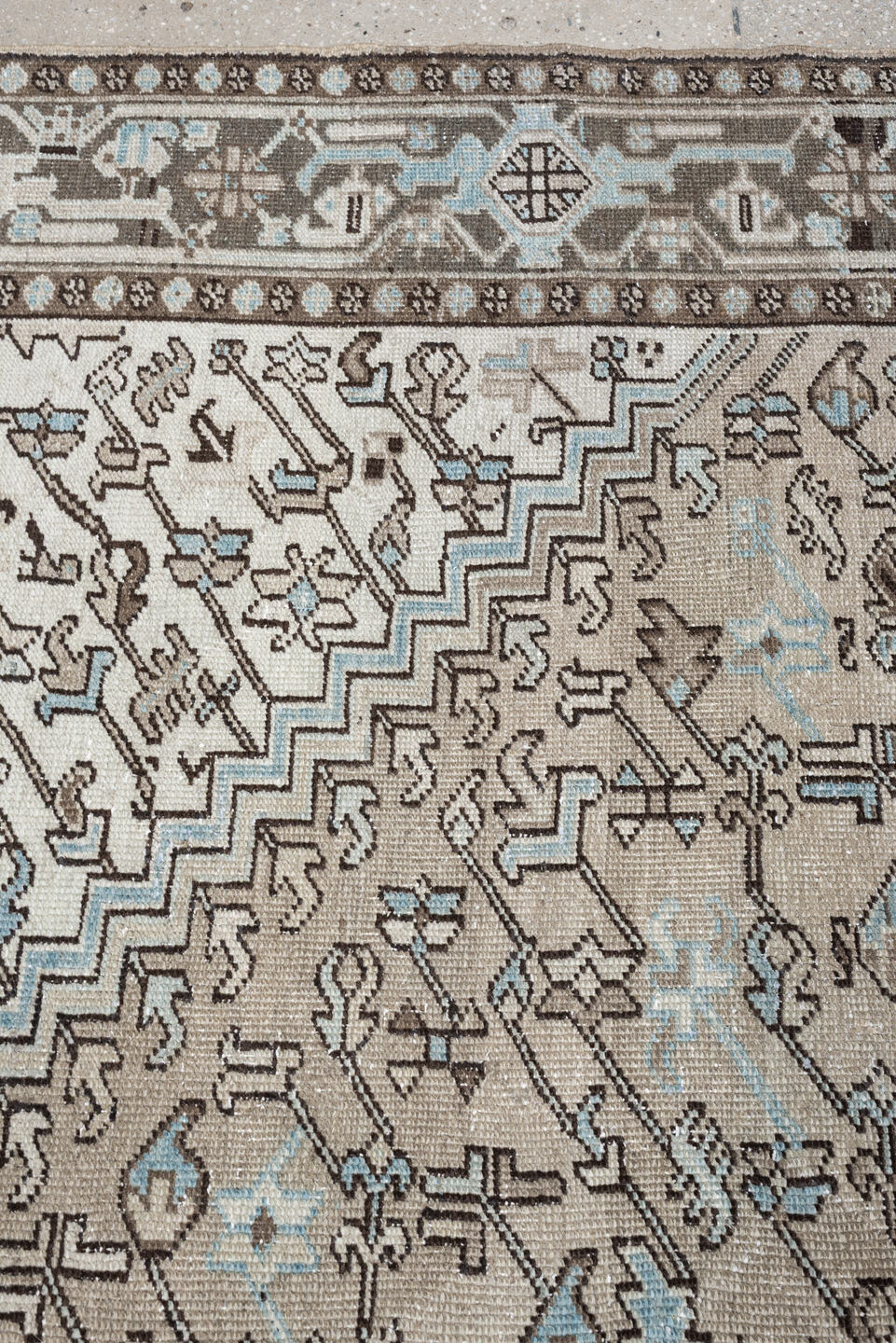 7' x 11' one-of-a-kind handmade antique Heriz large size rug. Color palette: ivory, taupe, charcoal, slate blue, dark brown