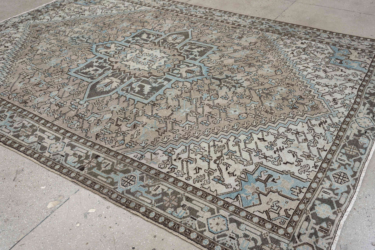 7' x 11' one-of-a-kind handmade antique Heriz large size rug. Color palette: ivory, taupe, charcoal, slate blue, dark brown