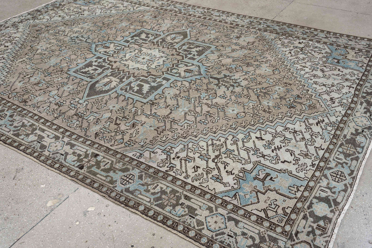 7' x 11' one-of-a-kind handmade antique Heriz large size rug. Color palette: ivory, taupe, charcoal, slate blue, dark brown
