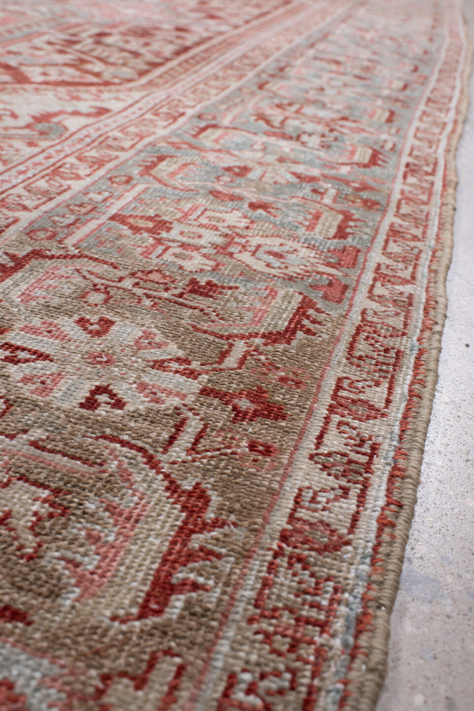 7' x 10' one-of-a-kind handmade antique Heriz large size rug. Color palette: brick red, blue gray, ivory, rose, taupe