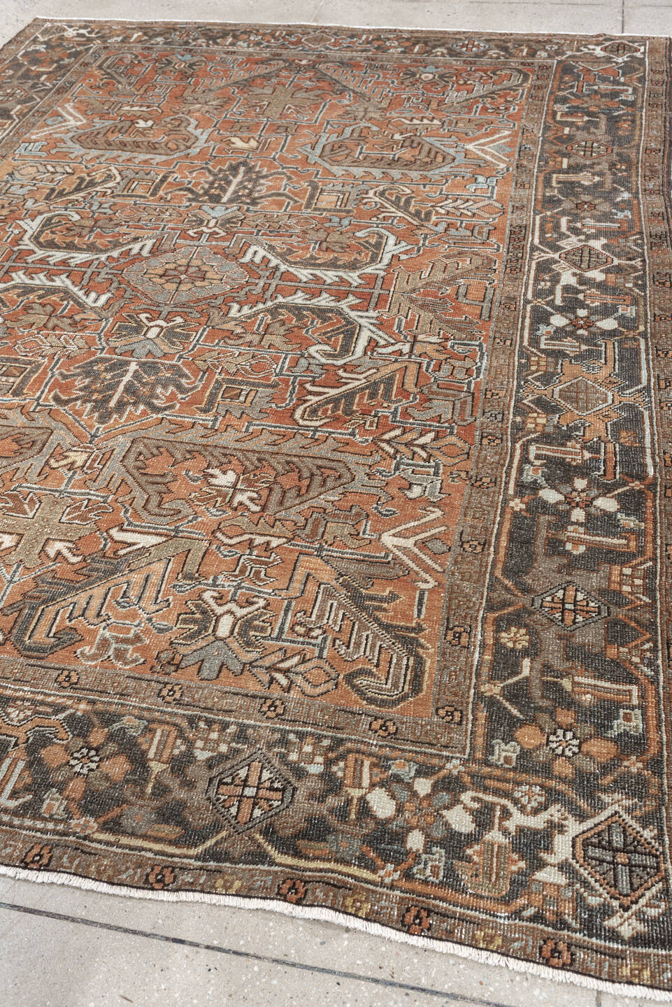 6' x 8' one-of-a-kind handmade antique Heriz medium size rug. Color palette: terracotta, charcoal, ivory, taupe, sage, slate