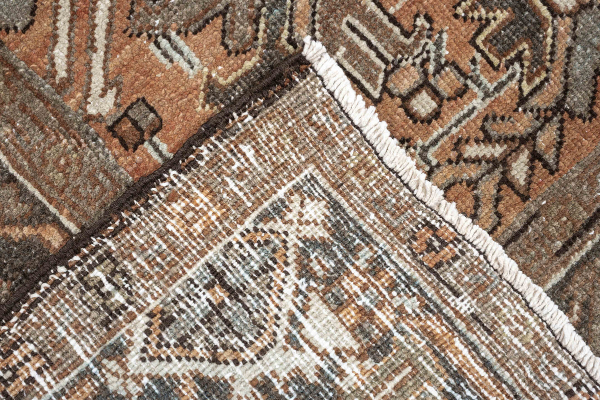 6' x 8' one-of-a-kind handmade antique Heriz medium size rug. Color palette: terracotta, charcoal, ivory, taupe, sage, slate
