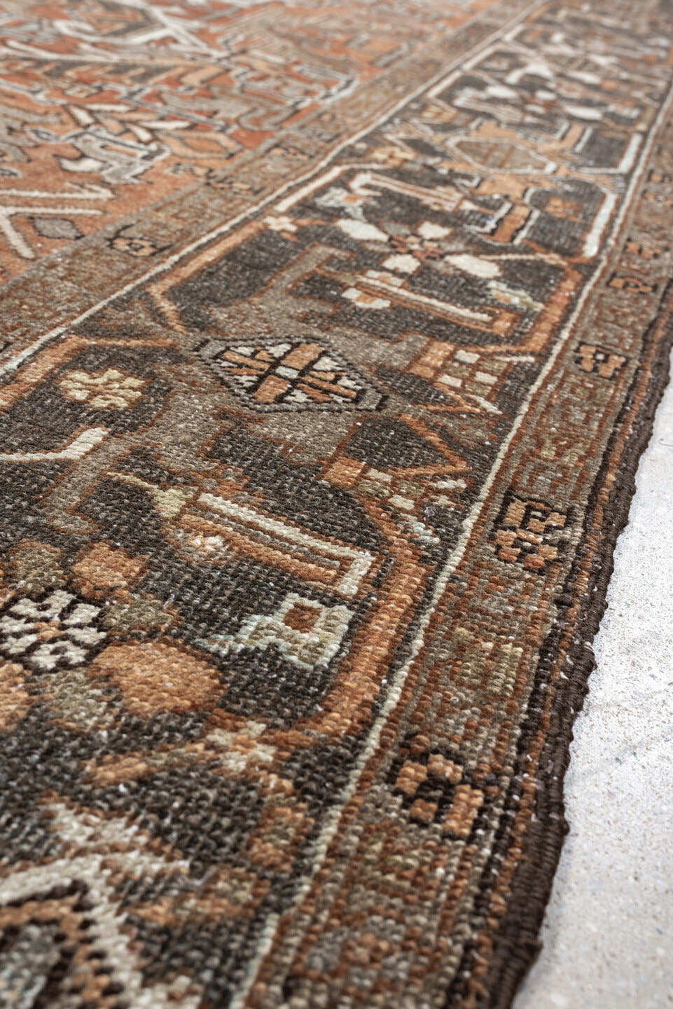 6' x 8' one-of-a-kind handmade antique Heriz medium size rug. Color palette: terracotta, charcoal, ivory, taupe, sage, slate