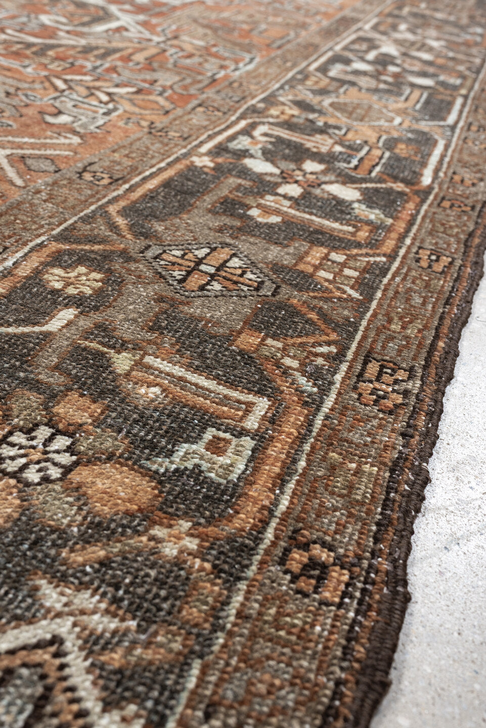 6' x 8' one-of-a-kind handmade antique Heriz medium size rug. Color palette: terracotta, charcoal, ivory, taupe, sage, slate