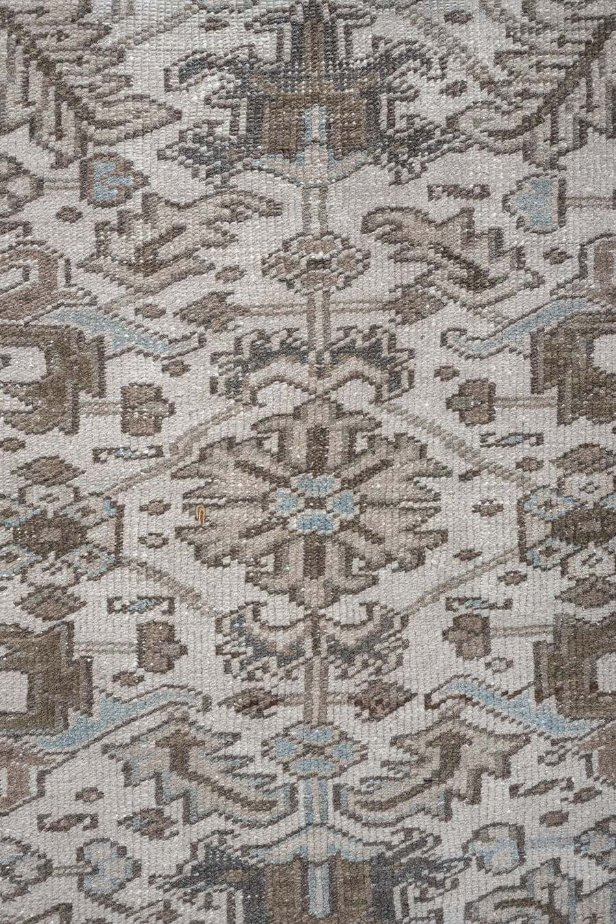 7' x 10' one-of-a-kind handmade antique Heriz large size rug. Color palette: ivory, taupe, charcoal, pale blue, brown, gray