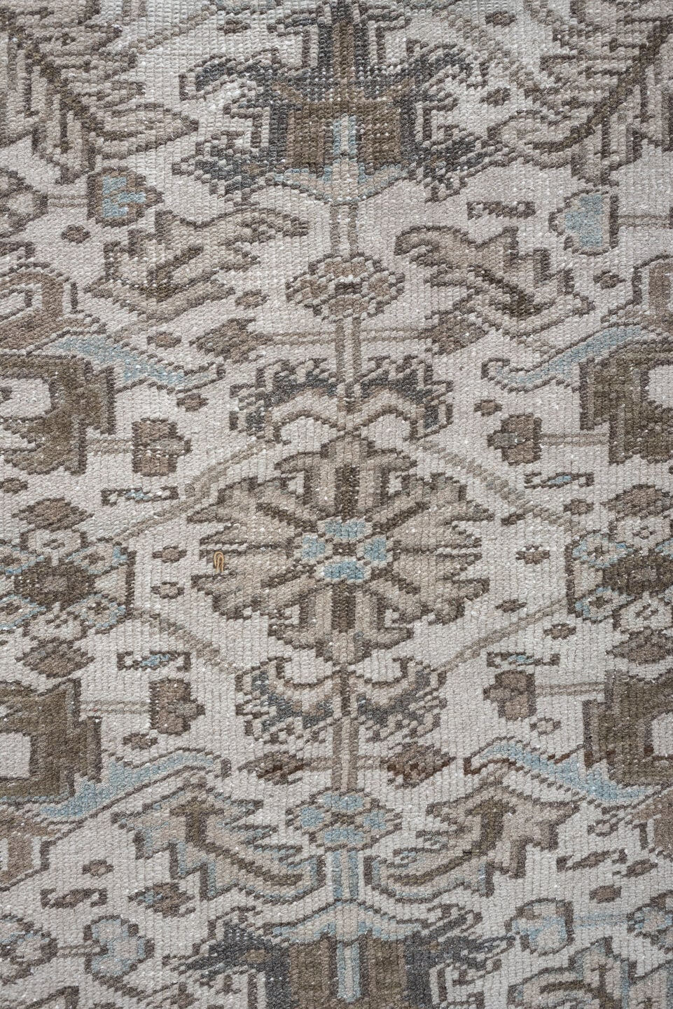7' x 10' one-of-a-kind handmade antique Heriz large size rug. Color palette: ivory, taupe, charcoal, pale blue, brown, gray
