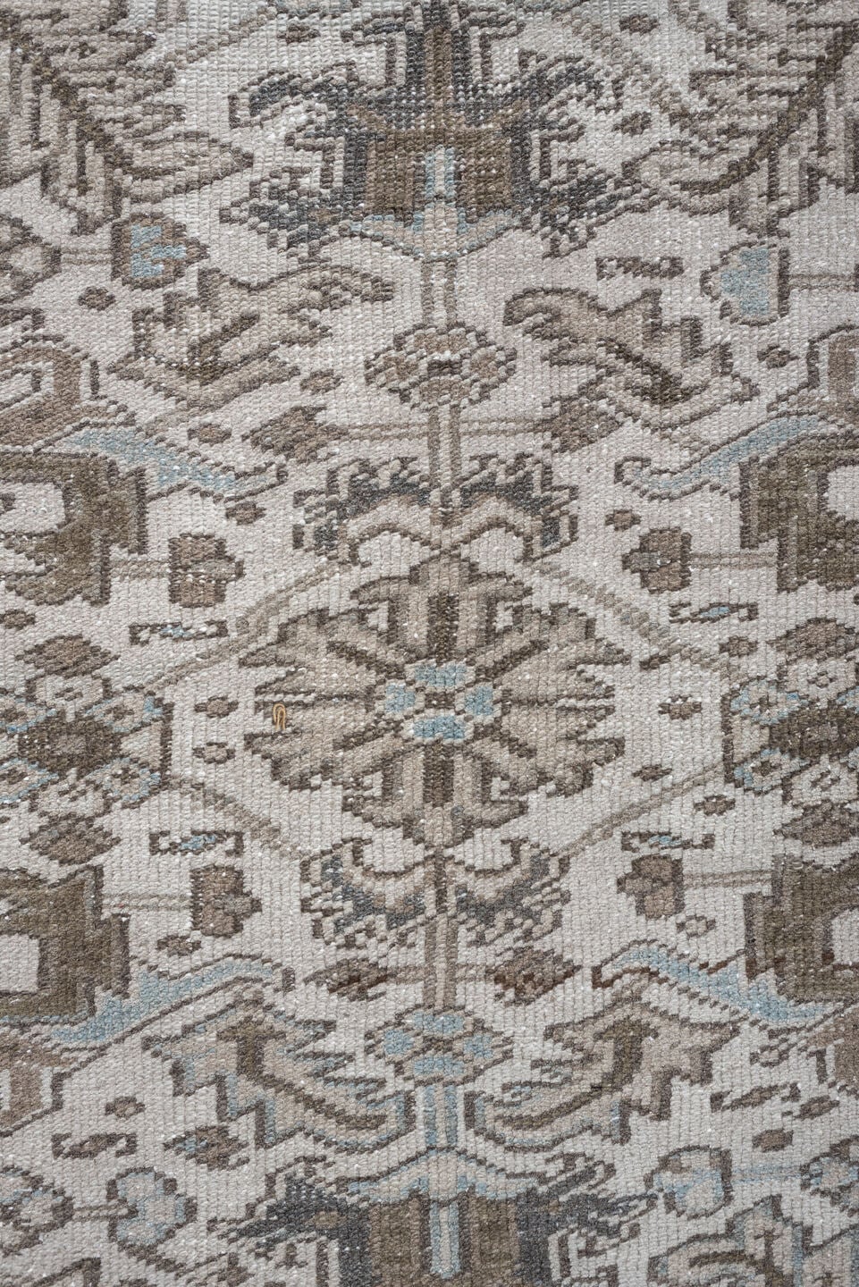 7' x 10' one-of-a-kind handmade antique Heriz large size rug. Color palette: ivory, taupe, charcoal, pale blue, brown, gray