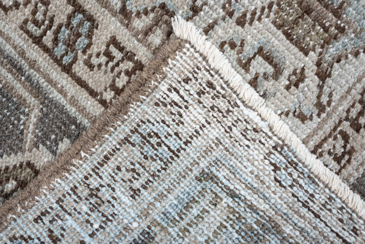 7' x 10' one-of-a-kind handmade antique Heriz large size rug. Color palette: ivory, taupe, charcoal, pale blue, brown, gray