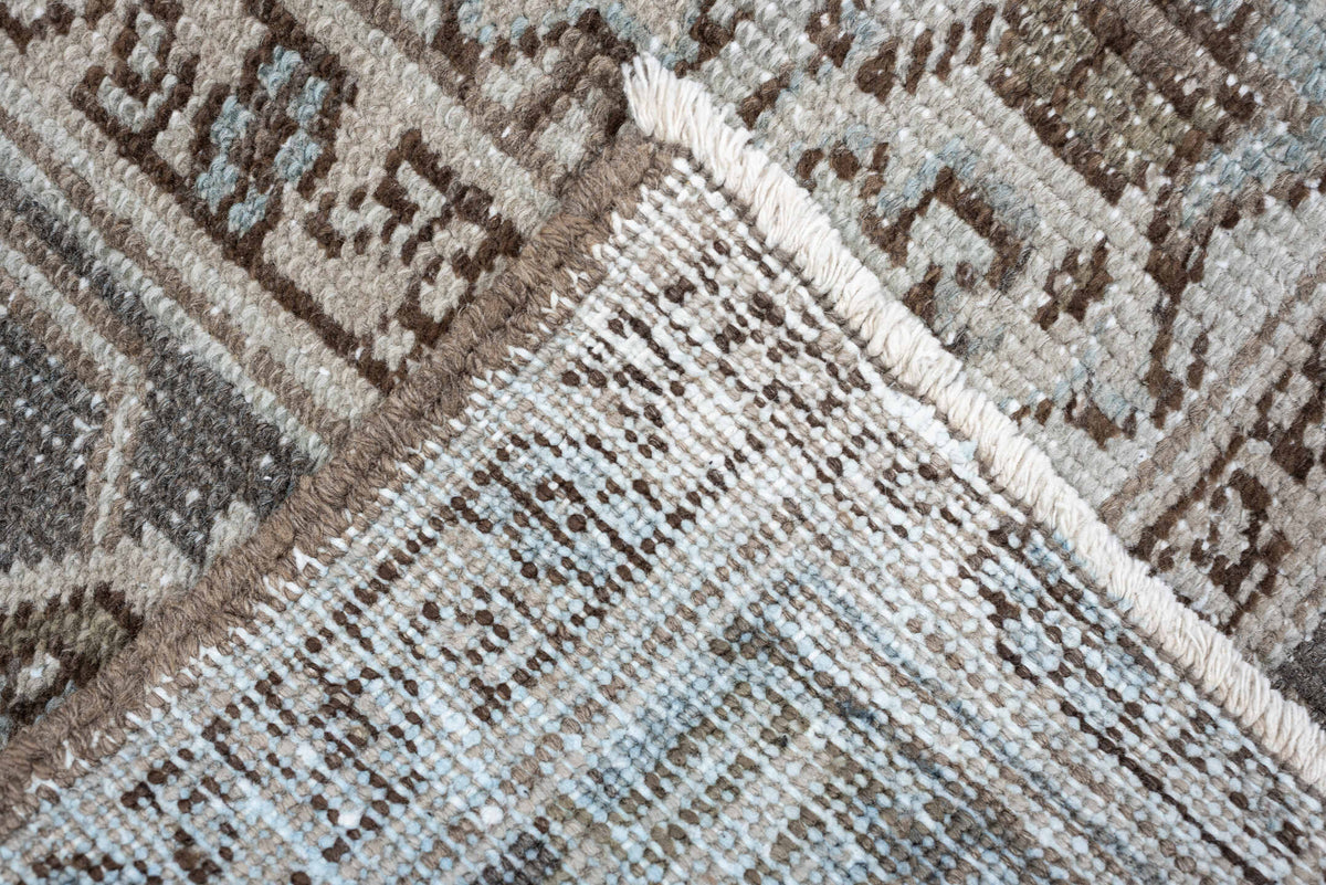 7' x 10' one-of-a-kind handmade antique Heriz large size rug. Color palette: ivory, taupe, charcoal, pale blue, brown, gray