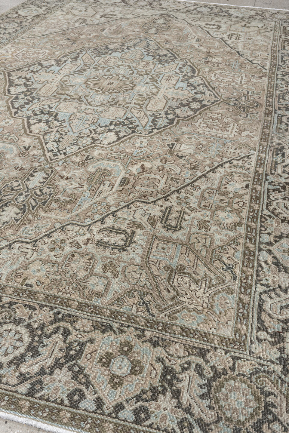 8' x 11' one-of-a-kind handmade antique Heriz large size rug. Color palette: taupe, ivory, charcoal, pale blue, camel, slate