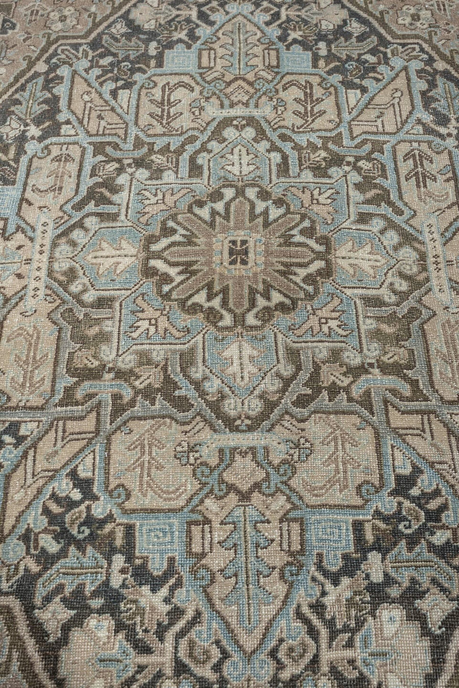 8' x 11' one-of-a-kind handmade antique Heriz large size rug. Color palette: taupe, ivory, charcoal, pale blue, camel, slate