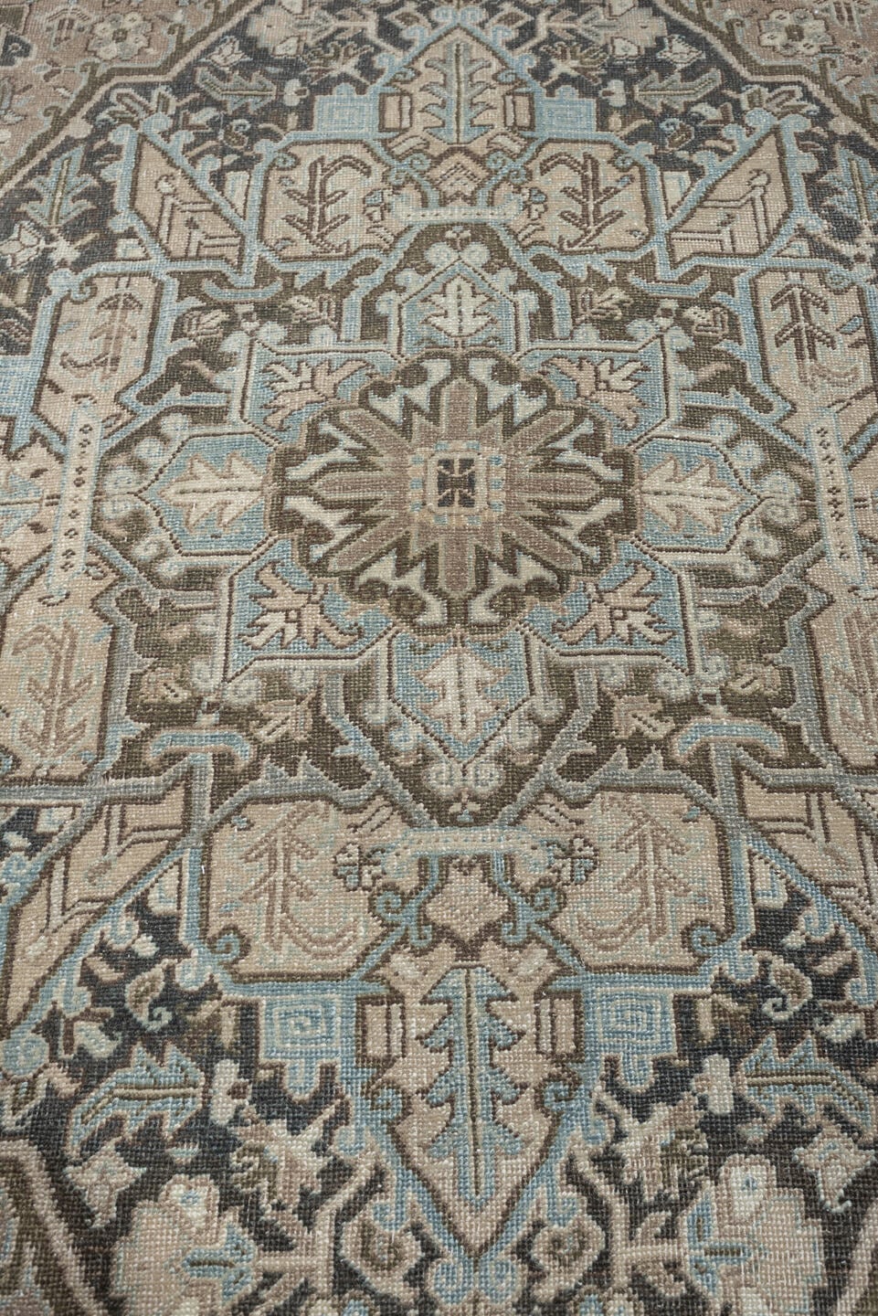 8' x 11' one-of-a-kind handmade antique Heriz large size rug. Color palette: taupe, ivory, charcoal, pale blue, camel, slate