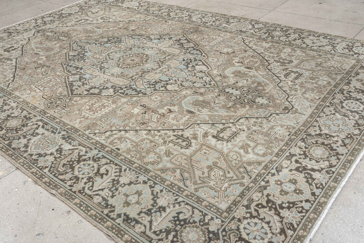 8' x 11' one-of-a-kind handmade antique Heriz large size rug. Color palette: taupe, ivory, charcoal, pale blue, camel, slate