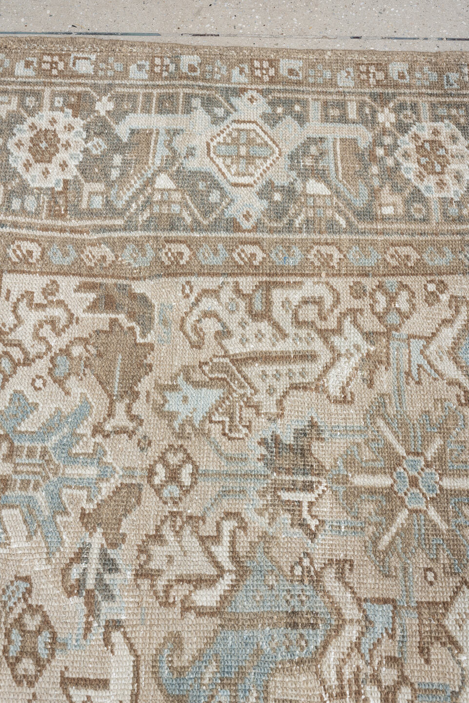 7' x 10' one-of-a-kind handmade antique Heriz large size rug. Color palette: taupe, brown, ivory, pale blue, charcoal, slate