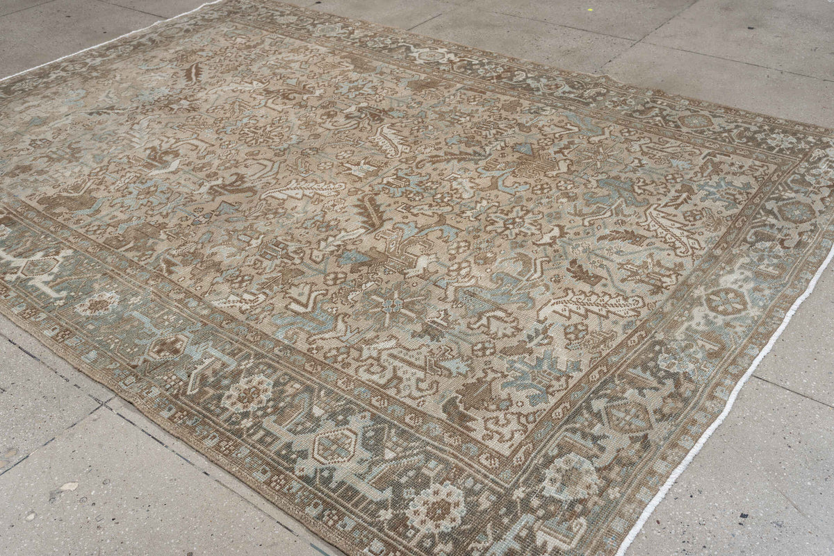 7' x 10' one-of-a-kind handmade antique Heriz large size rug. Color palette: taupe, brown, ivory, pale blue, charcoal, slate