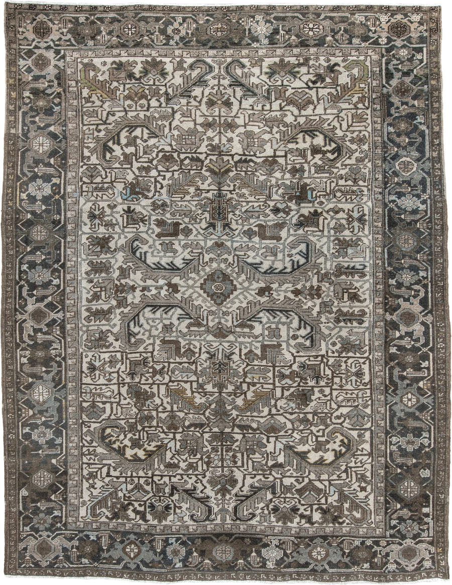 7' x 9' one-of-a-kind handmade antique Heriz large size rug. Color palette: ivory, charcoal, taupe, slate blue, olive, camel