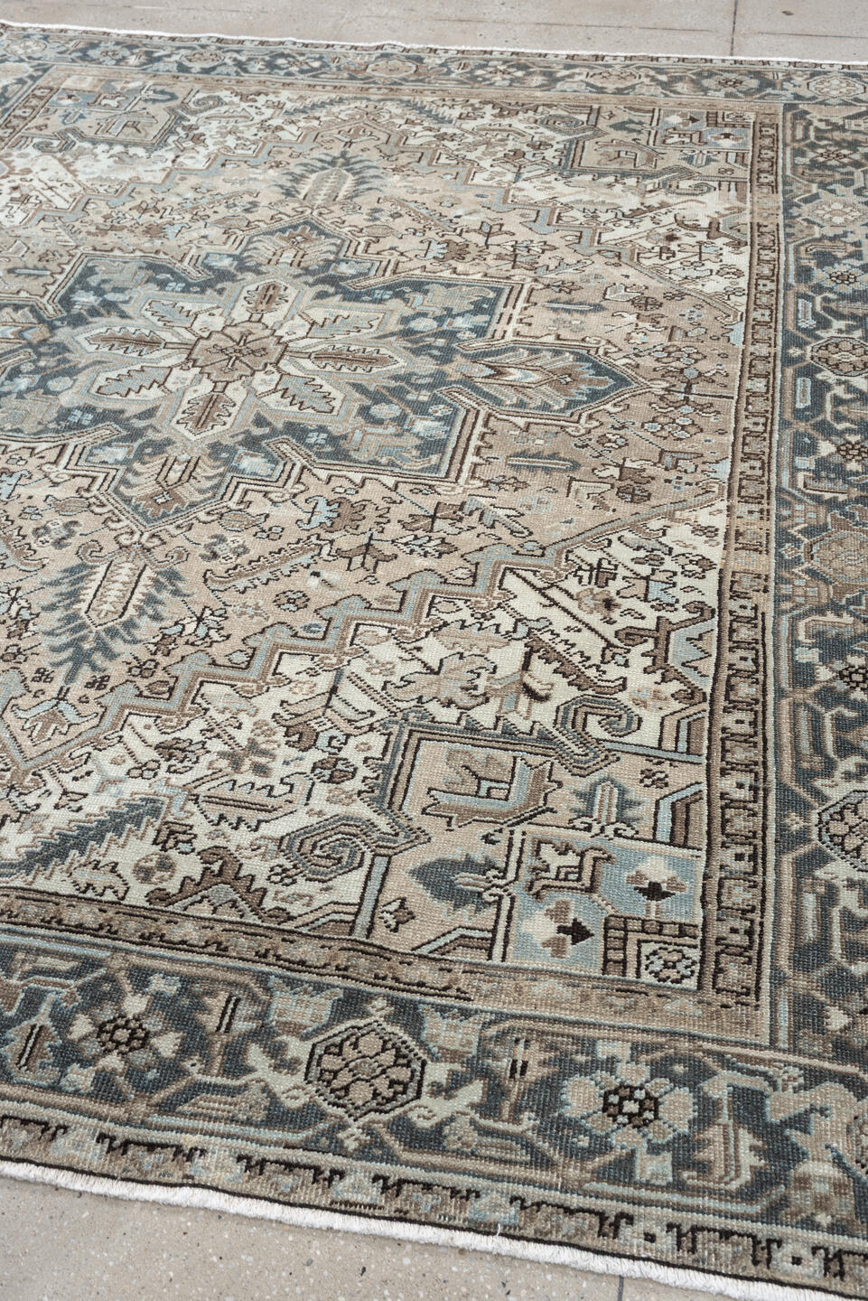 7' x 8' one-of-a-kind handmade antique Heriz rug. Color palette: ivory, blue gray, taupe, slate, brown, charcoal, sage