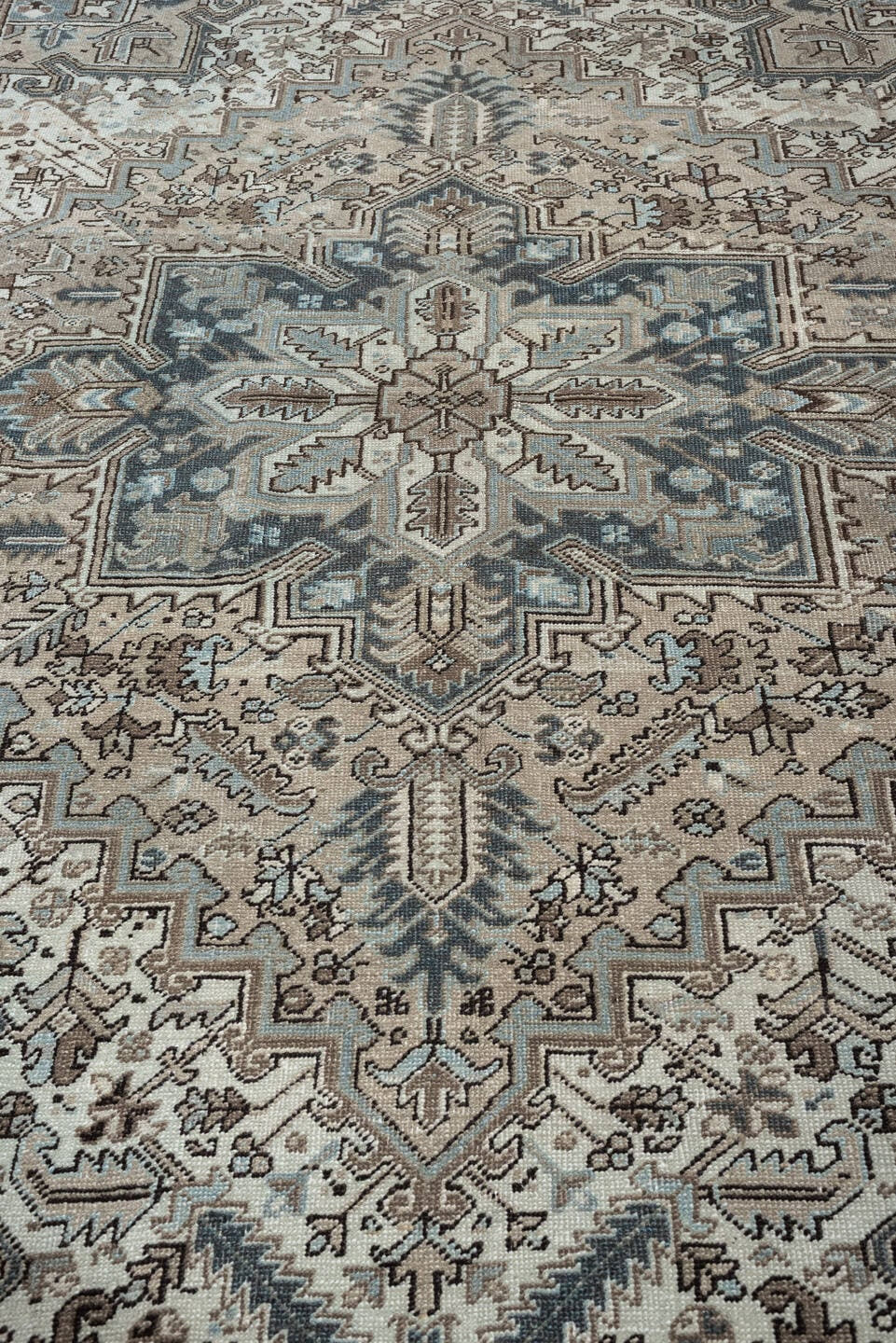 7' x 8' one-of-a-kind handmade antique Heriz rug. Color palette: ivory, blue gray, taupe, slate, brown, charcoal, sage