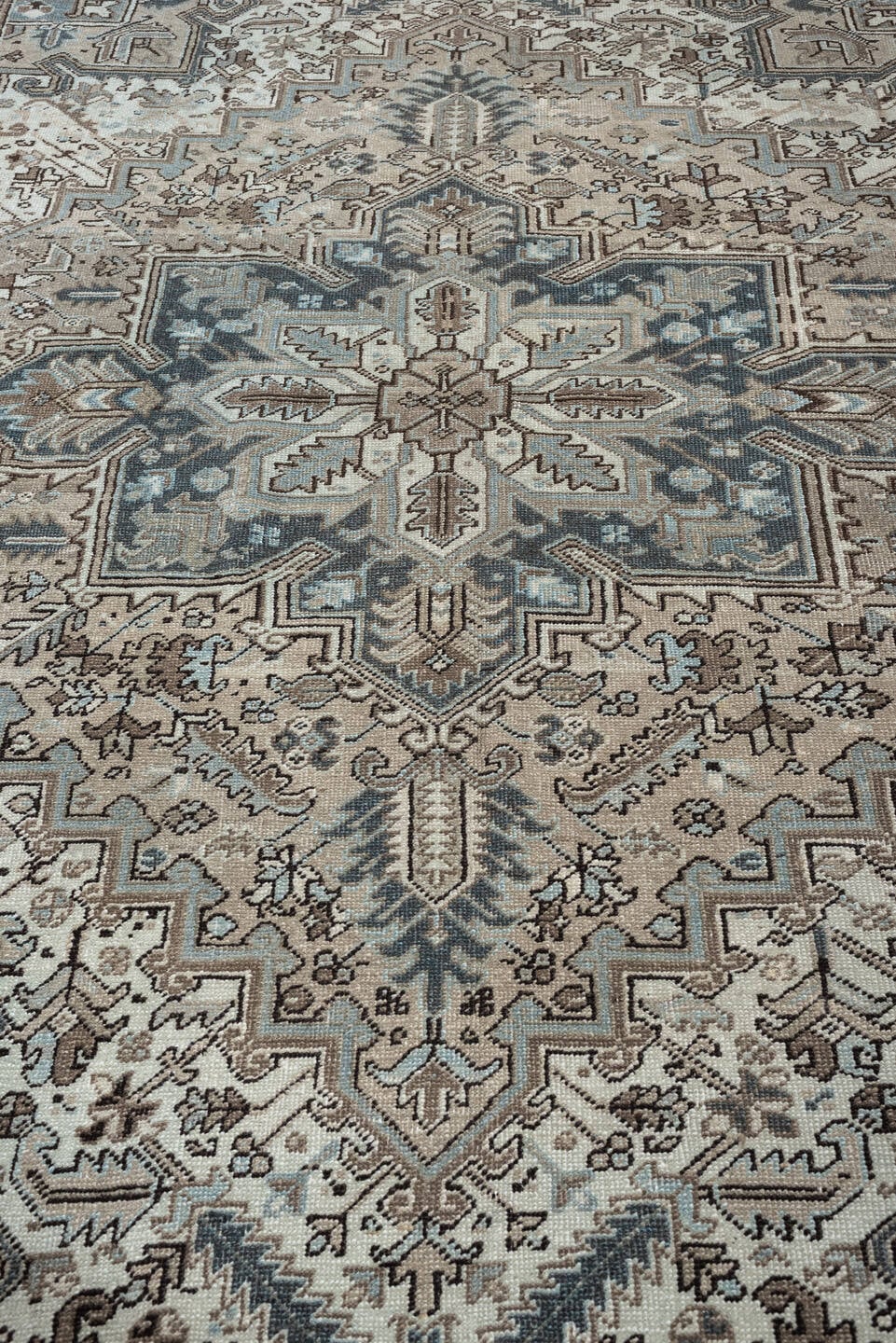 7' x 8' one-of-a-kind handmade antique Heriz rug. Color palette: ivory, blue gray, taupe, slate, brown, charcoal, sage