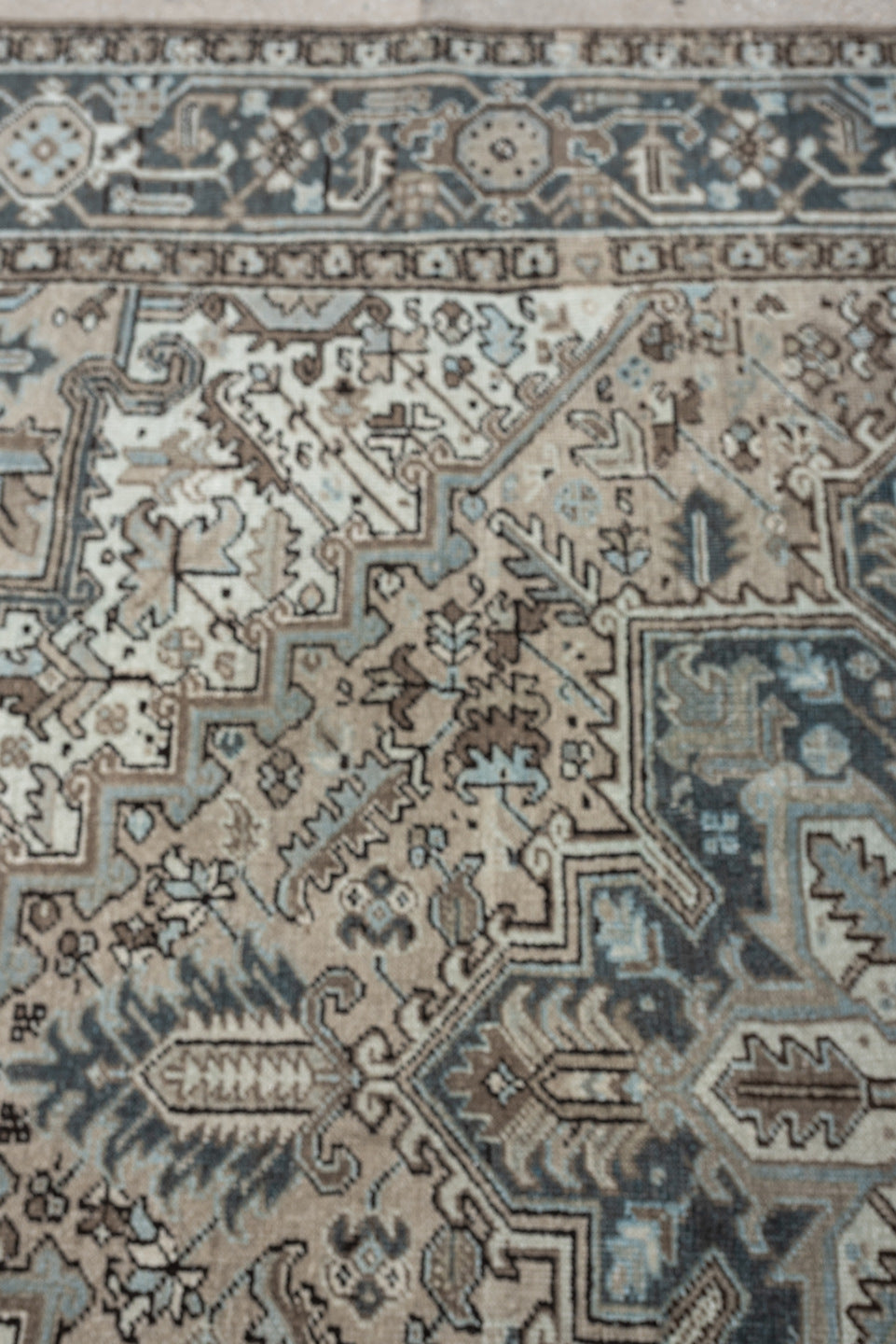 7' x 8' one-of-a-kind handmade antique Heriz rug. Color palette: ivory, blue gray, taupe, slate, brown, charcoal, sage