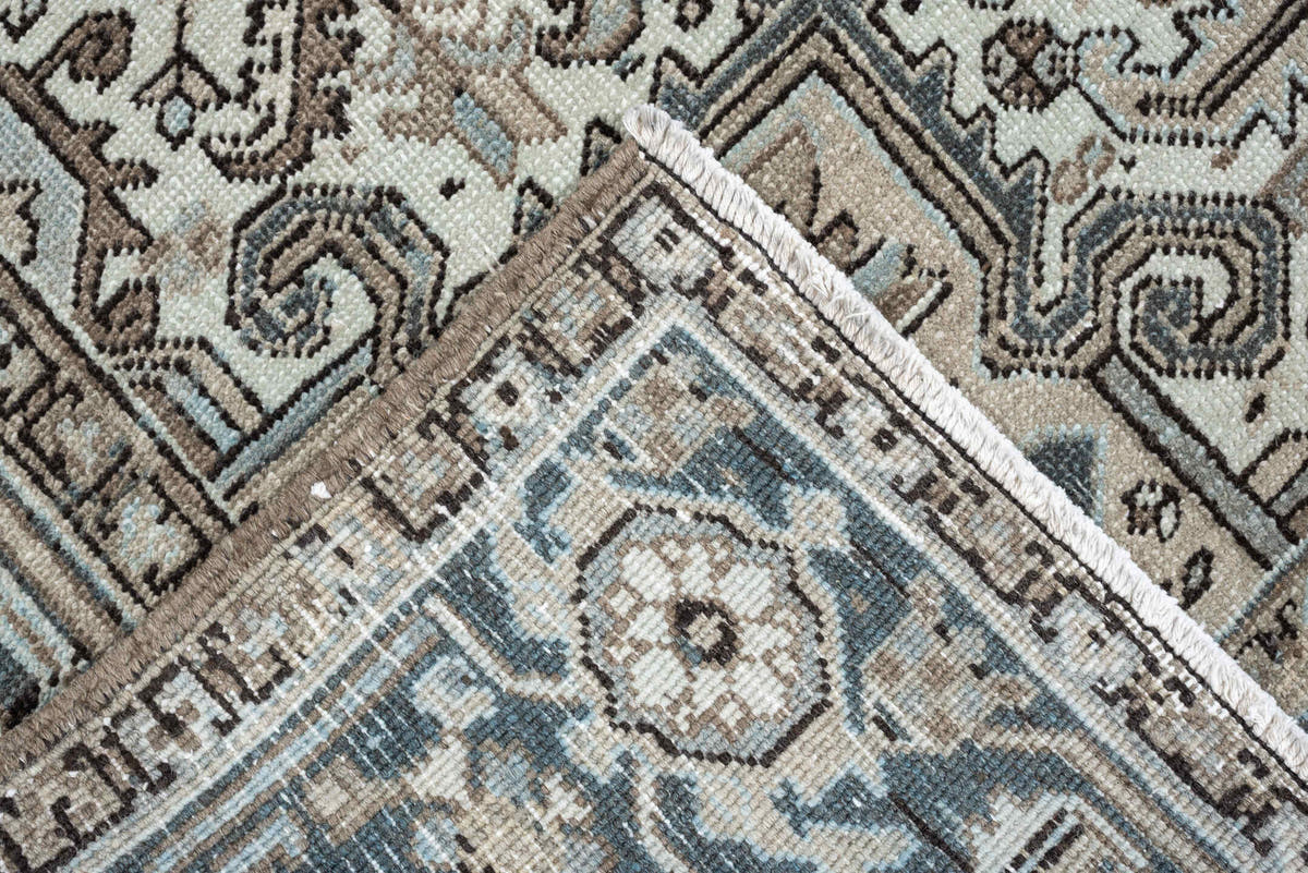 7' x 8' one-of-a-kind handmade antique Heriz rug. Color palette: ivory, blue gray, taupe, slate, brown, charcoal, sage