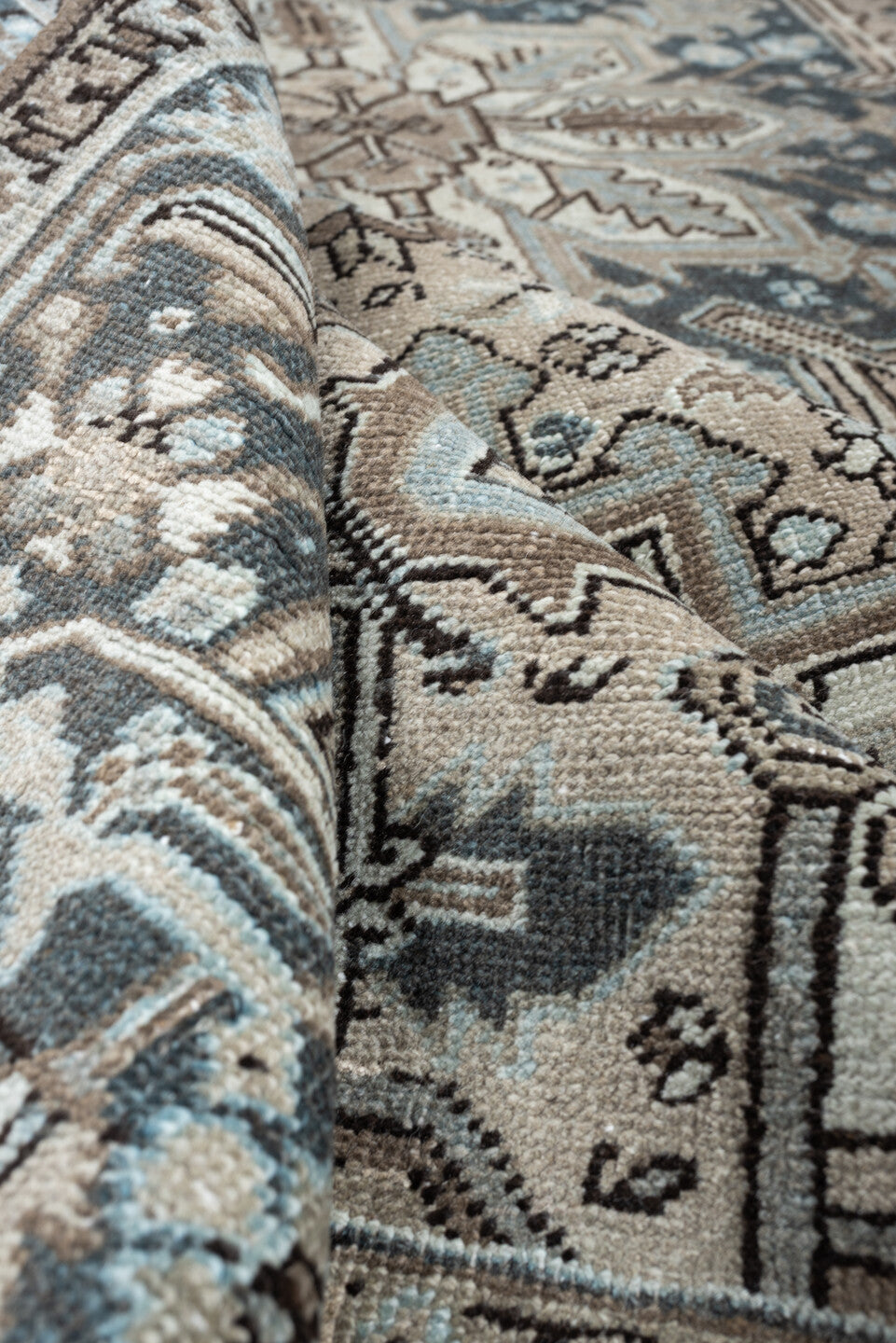 7' x 8' one-of-a-kind handmade antique Heriz rug. Color palette: ivory, blue gray, taupe, slate, brown, charcoal, sage